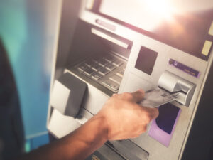 person using an ATM